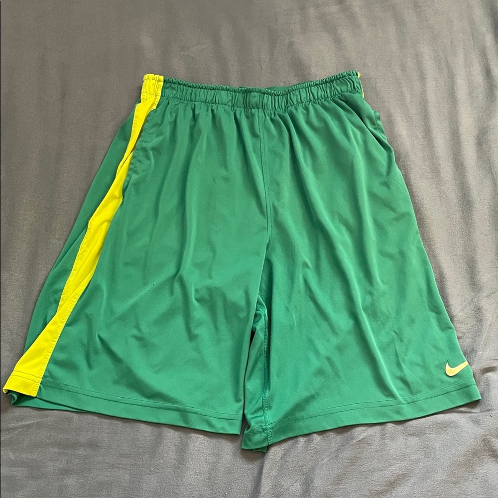 Nike Green Shorts with Yellow Stripes